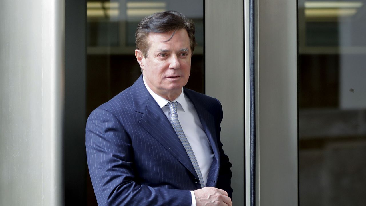 FILE - In this Feb. 14, 2018 file photo, Paul Manafort, President Donald Trump's former campaign chairman, leaves the federal courthouse in Washington. (AP Photo/Pablo Martinez Monsivais, File)