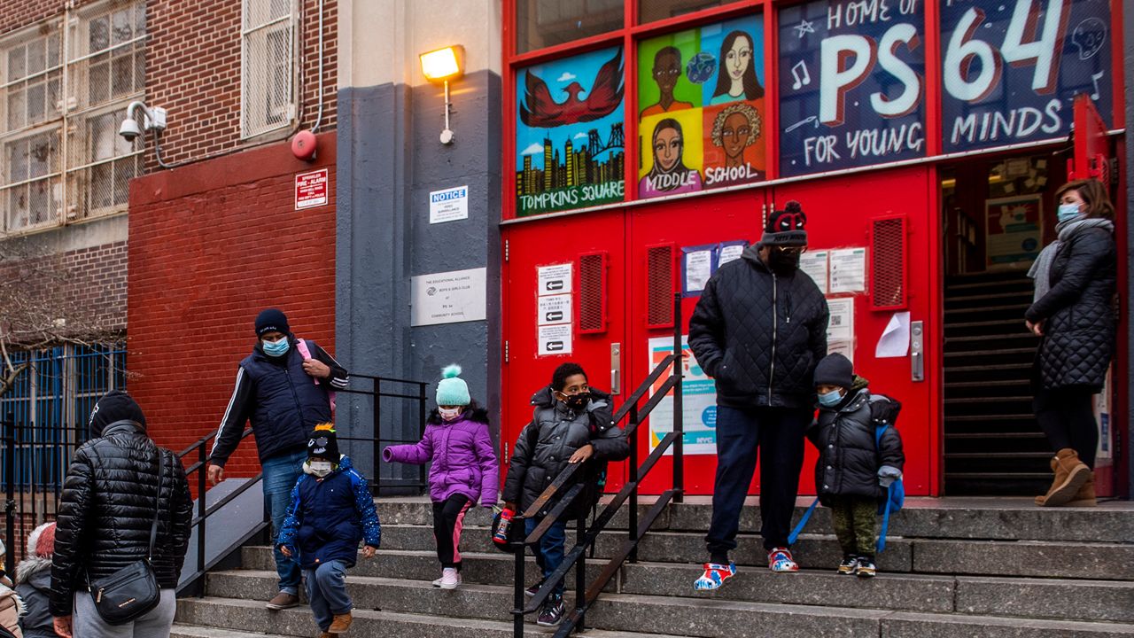 Children leave P.S. 64 in the East Village in December 2021. (AP Photo/Brittainy Newman, File)