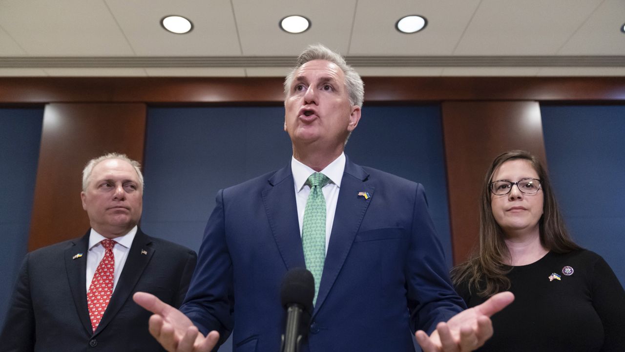 House Minority Whip Steve Scalise of La., left, House Minority Leader Kevin McCarthy of Calif., and Rep. Elise Stefanik, R-N.Y., speak with reporters after watching a speech by Ukrainian President Volodymyr Zelenskyy live-streamed into the U.S. Capitol, in Washington, Wednesday, March 16, 2022. (AP Photo/Alex Brandon)