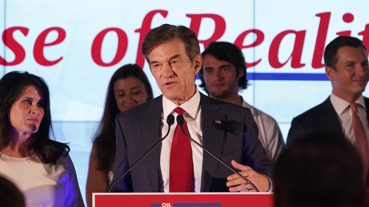 Mehmet Oz, a Republican candidate for U.S. Senate in Pennsylvania, speaks to supporters at a primary night election gathering in Newtown, Pa., Tuesday, May 17, 2022. (AP Photo/Seth Wenig)