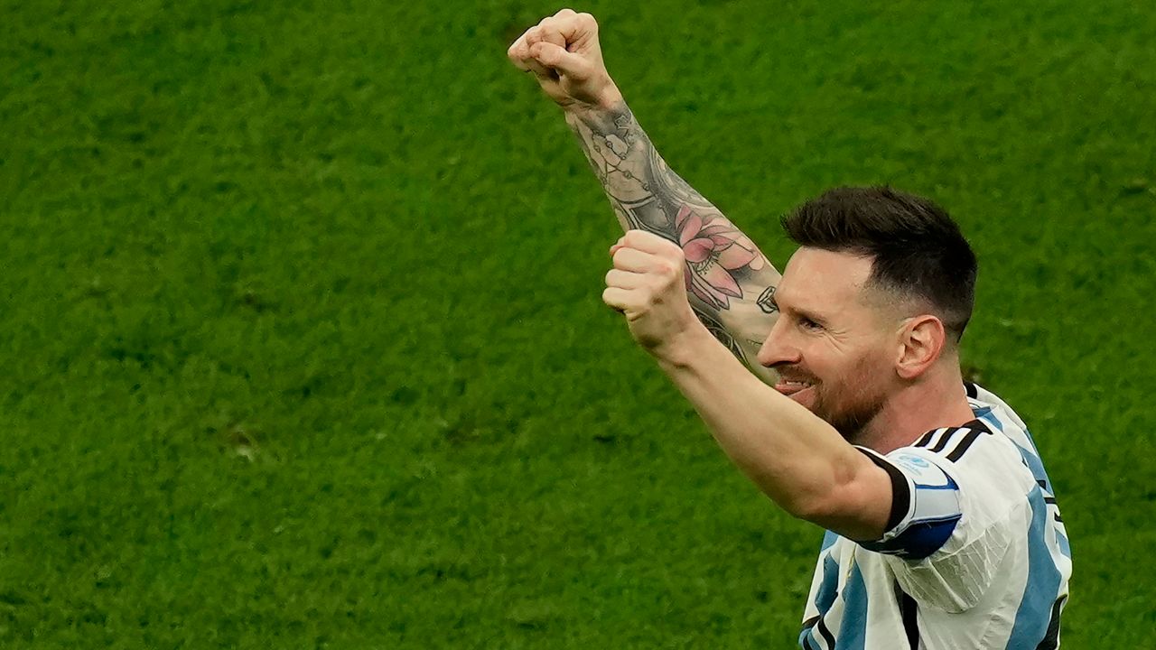 Argentina's Lionel Messi celebrates after scoring the opening goal of the World Cup final against France in Lusail, Qatar on Sunday. (AP Photo/Francisco Seco)