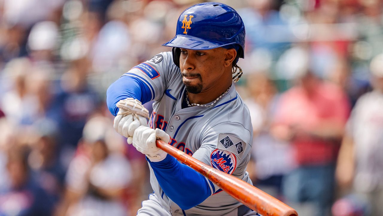 Mets reach playoffs with win over Braves