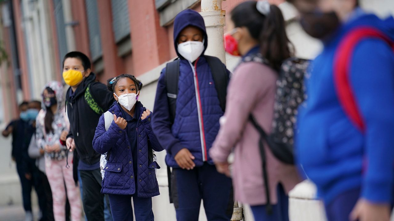 Students line up for school