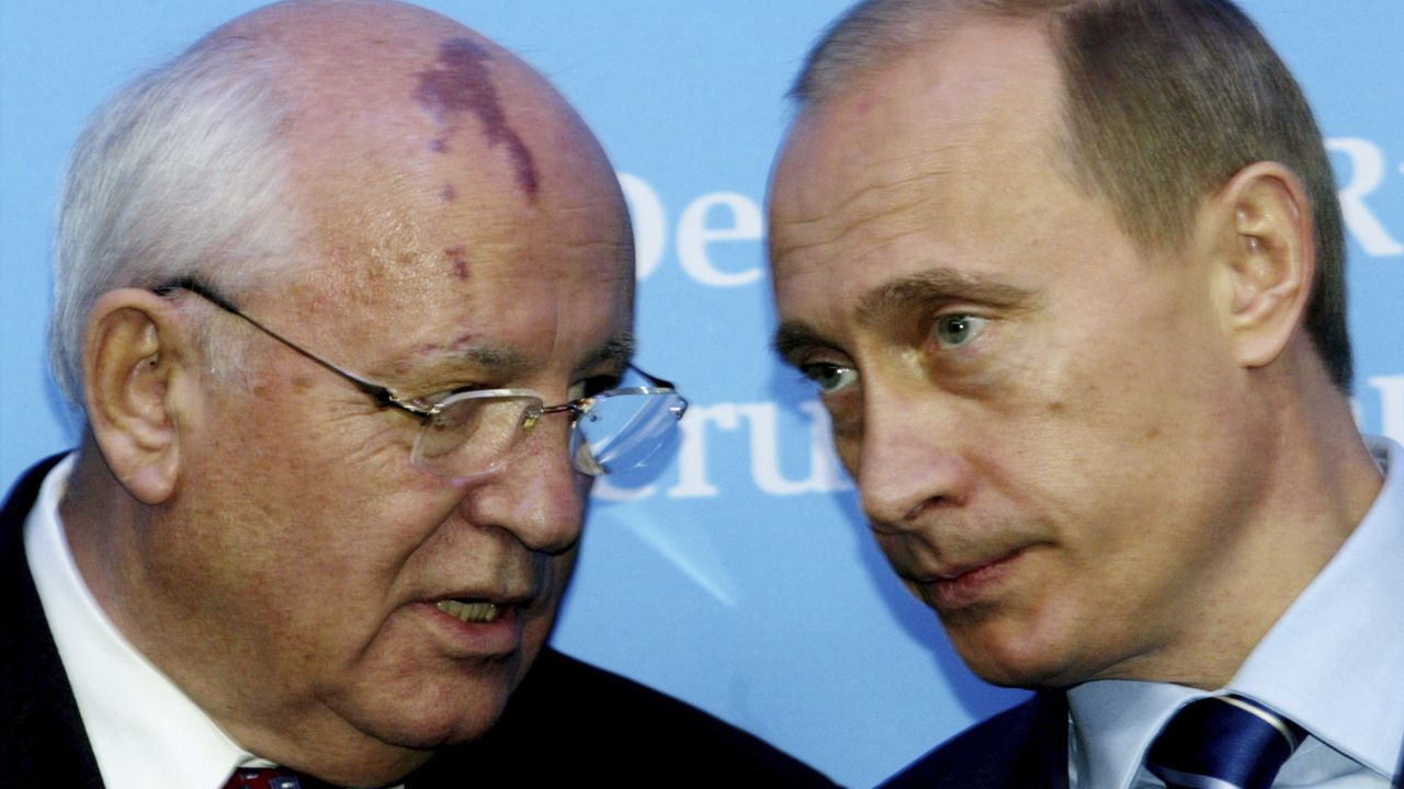 Russia's President Vladimir Putin, right, talks with former Soviet President Mikhail Gorbachev at the start of a news conference at the Castle of Gottorf in Schleswig, northern Germany, Tuesday, Dec. 21, 2004. (AP Photo/Heribert Proepper, File)