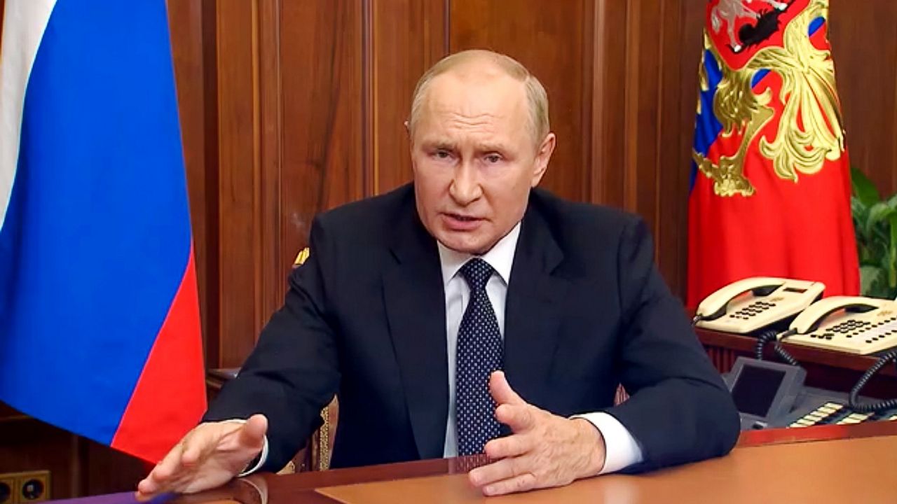 In this image made from video released by the Russian Presidential Press Service, Russian President Vladimir Putin gestures Wednesday as he addresses the nation in Moscow, Russia. (Russian Presidential Press Service via AP)