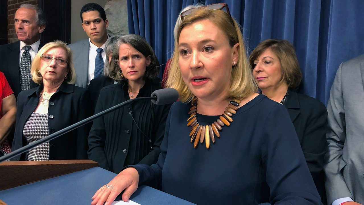 In this May 7, 2019 photo, Illinois state Rep. Anna Moeller, D-Elgin, speaks to reporters at a news conference in in Springfield, Il. Moeller is sponsoring legislation to repeal a law requiring that their parents or guardians of minors seeking abortions be notified at least 48 hours in advance. (AP Photo by John O'Connor)