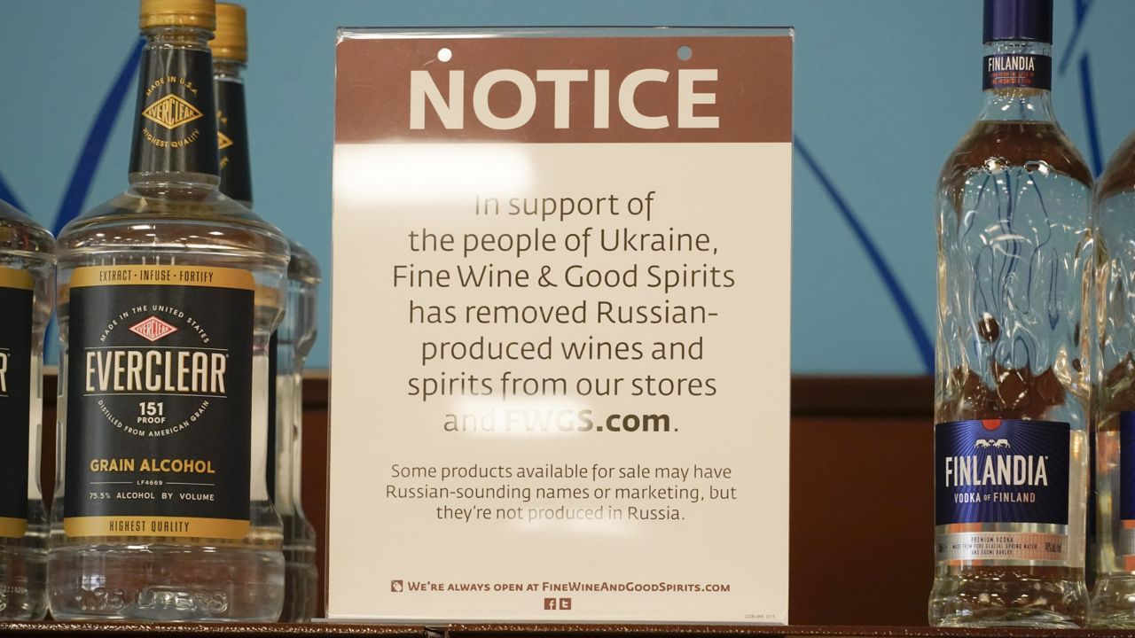 A sign in the vodka area of a Pennsylvania Fine Wine and Good Spirits store reflects the states decision to withdraw Russian-made products for sale, Monday, Feb. 28, 2022, in Harmony, Pa. (AP Photo/Keith Srakocic)