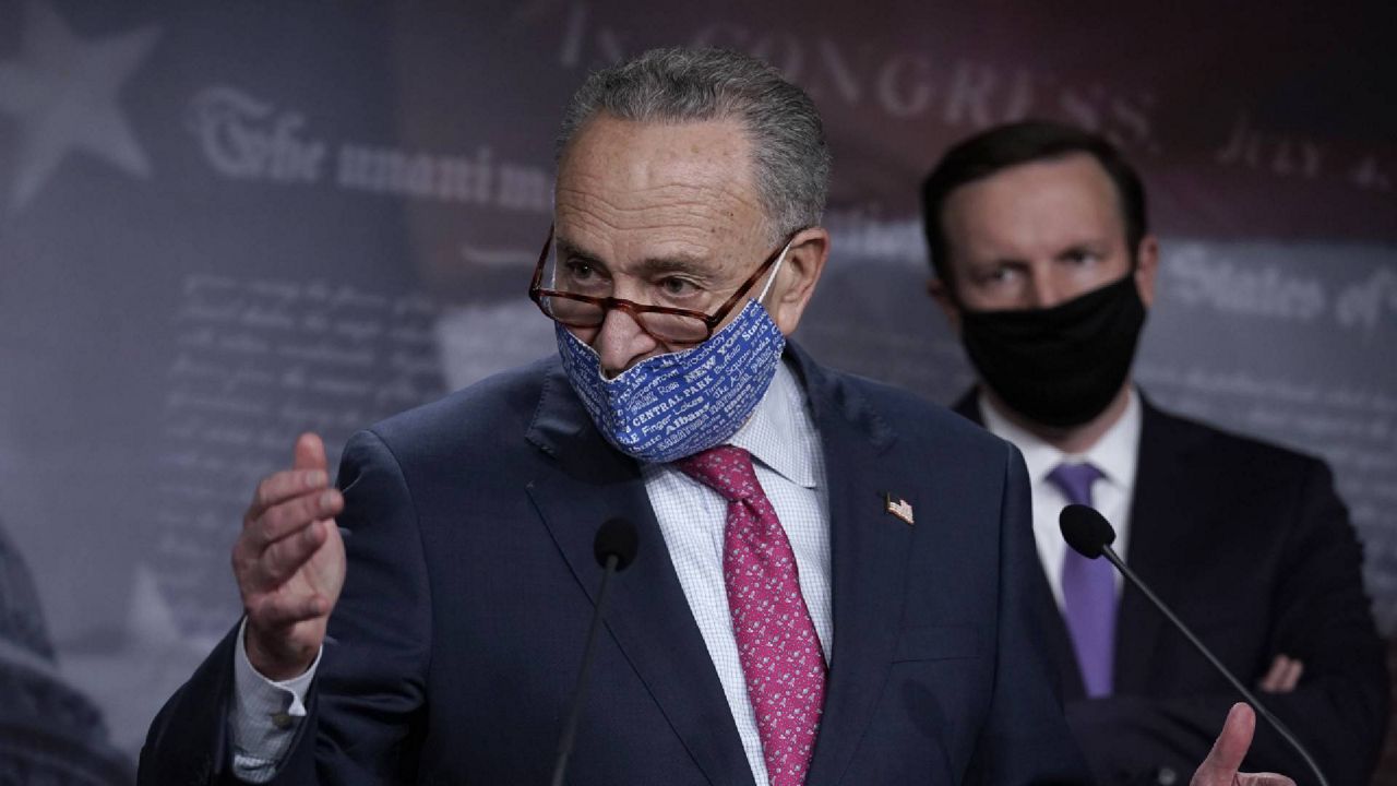 Senate Minority Leader Chuck Schumer talks to reporters on Nov. 10, 2020. (AP Photo/J. Scott Applewhite)