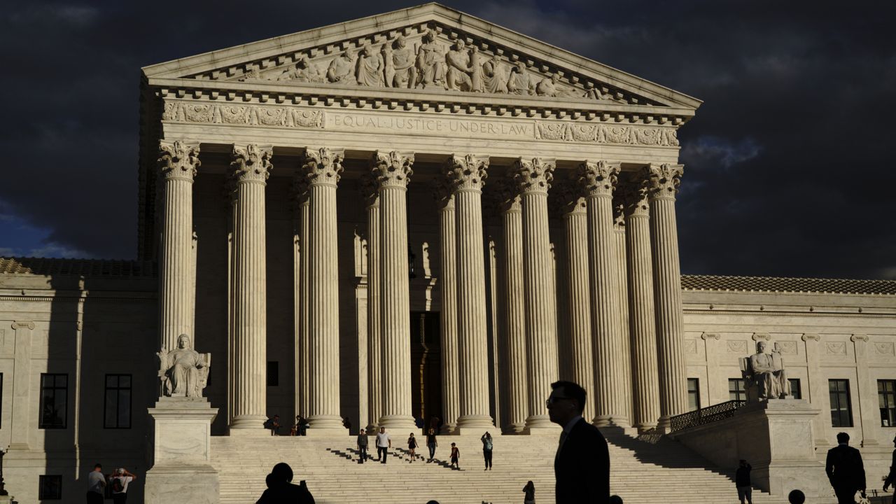 FILE - The U.S. Supreme Court building is seen at dusk in Washington on Oct. 22, 2021. (AP Photo/J. Scott Applewhite, File)