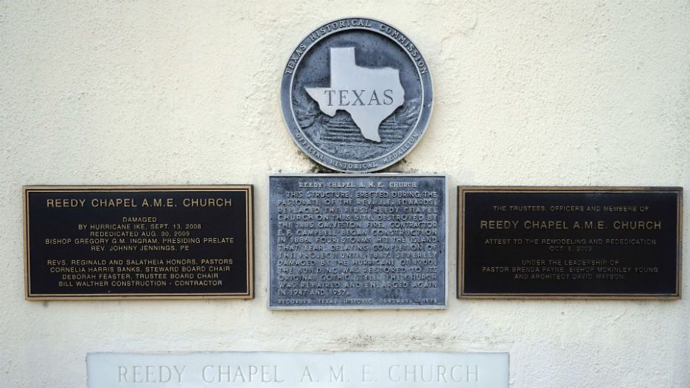 Historical markers outside the Reedy Chapel African Methodist Episcopal Church, are shown Wednesday, June 17, 2020, in Galveston, Texas. The church's origins date back to 1848 when black slaves were given the land by their white owners for a place of worship. It also continues to host a Juneteenth celebration that is attended by the community. (AP Photo/David J. Phillip)