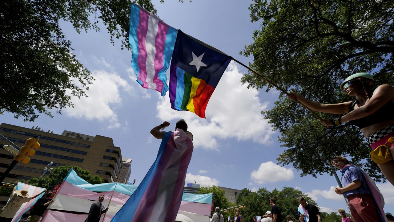 Demonstrators gather on the steps to the State Capitol to speak against transgender-related legislation bills being considered in the Texas Senate and Texas House on Thursday, May 20, 2021. (AP Photo/Eric Gay, File)