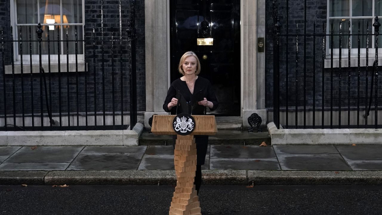 British Prime Minister Liz Truss delivers a statement regarding the death of Queen Elizabeth II outside Downing Street in London, Thursday, Sept. 8, 2022. (AP Photo/Alberto Pezzali)