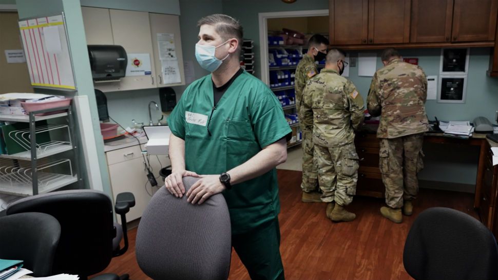 Health care workers in a Houston hospital. (Associated Press)