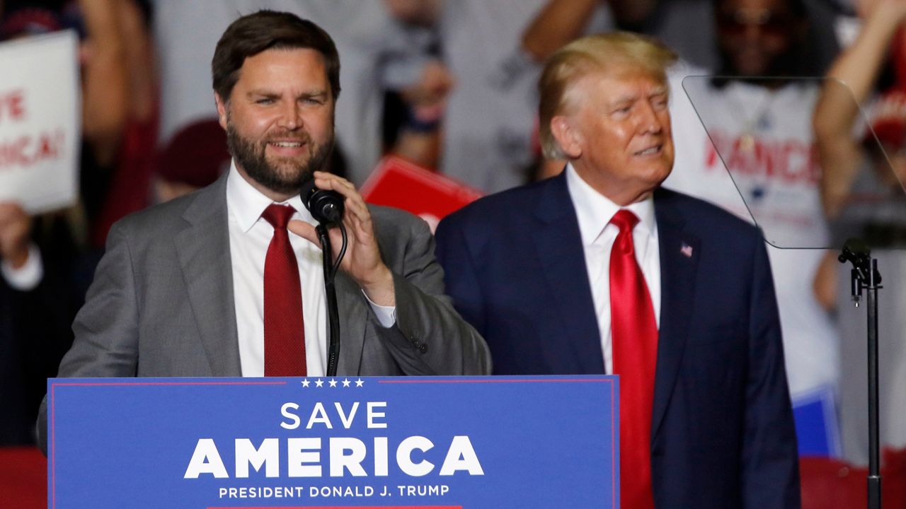 JD Vance, Republican candidate for U.S. Senator for Ohio, is accompanied by Former President Donald Trump as he speaks at a campaign rally in Youngstown, Ohio., Saturday, Sept. 17, 2022. (AP Photo/Tom E. Puskar)