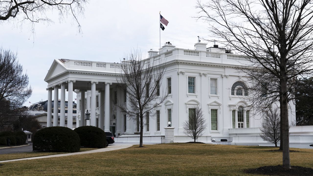 An American flag flies on top of the White House, Saturday, Feb. 12, 2022, in Washington. (AP Photo/Manuel Balce Ceneta, File)
