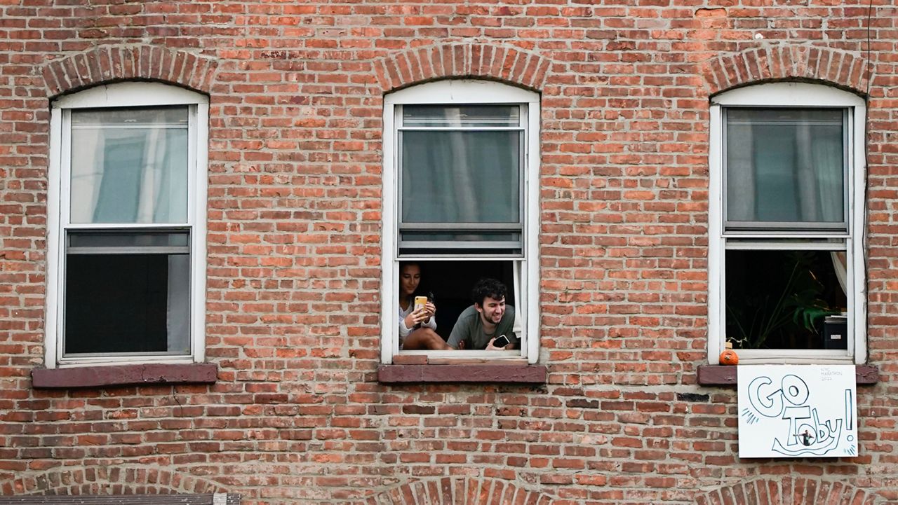 https://s7d2.scene7.com/is/image/TWCNews/apartment_windowmarathon_11142022