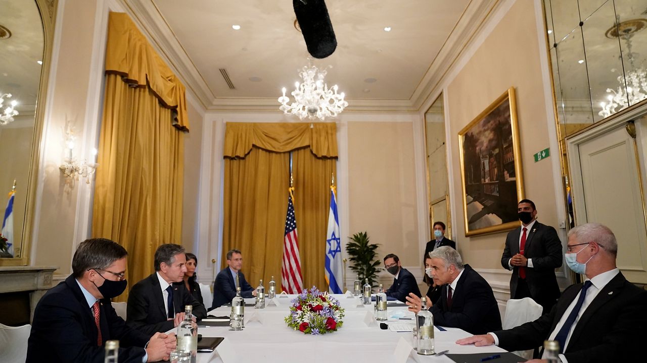 Secretary of State Antony Blinken and Israeli Foreign Minister Yair Lapid meet in Rome. (AP Photo/Andrew Harnik)