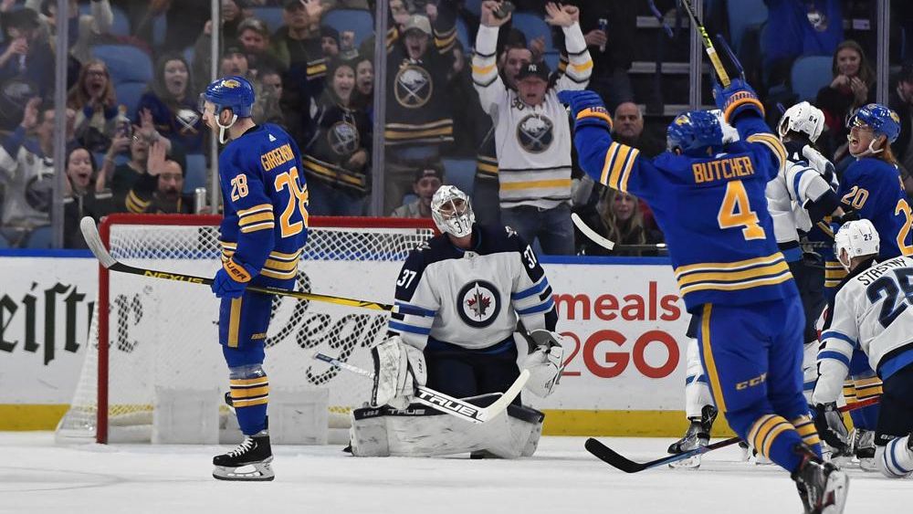 Injured goalie Eric Comrie rejoins Sabres on road trip, looks for