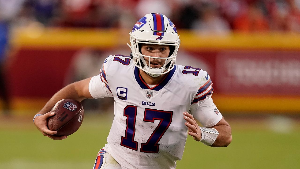 Buffalo Bills quarterback Josh Allen (17) runs with the ball