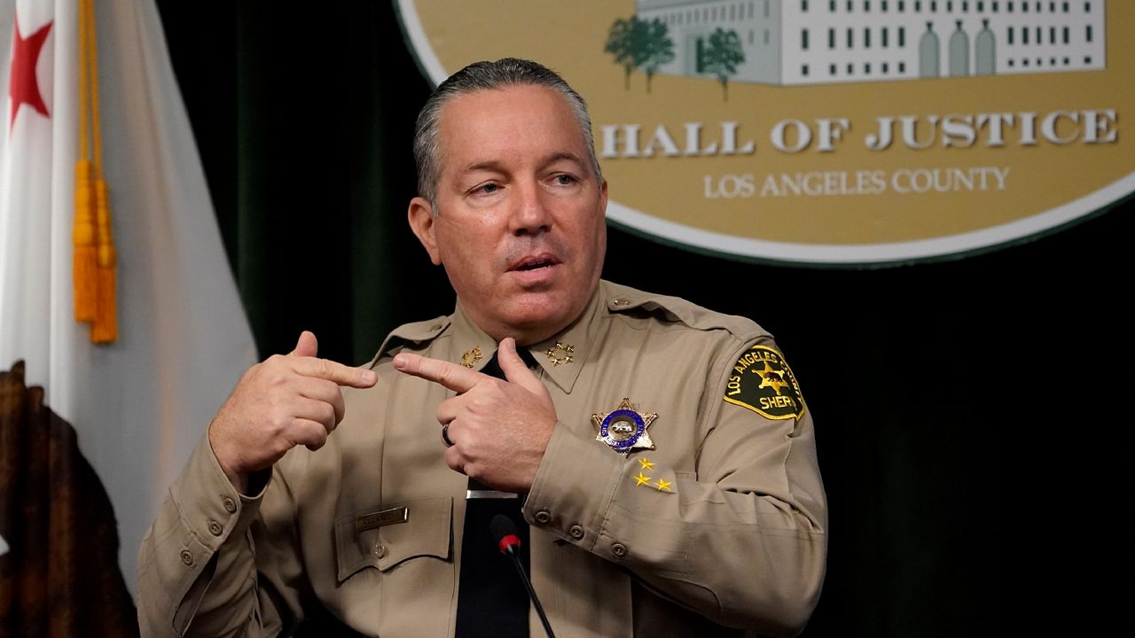 In this Sept. 17, 2020, file photo, Los Angeles County Sheriff Alex Villanueva comments during a news conference at the Hall of Justice in downtown Los Angeles. (AP Photo/Damian Dovarganes, File)
