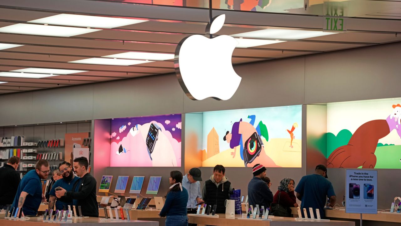 Customers shop in an Apple store in Pittsburgh Jan. 30, 2023. (AP Photo/Gene J. Puskar, File)