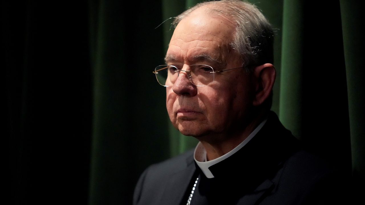 Archbishop of Los Angeles Jose H. Gomez pauses during a news conference at the Hall of Justice Monday, Feb. 20, 2023, in Los Angeles. (AP Photo/Damian Dovarganes)