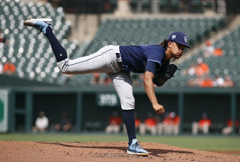 Tampa Bay Rays starting pitcher Chris Archer follows through on a pitch to the Baltimore Orioles in the first inning of the first baseball game of a doubleheader, Saturday, May 12, 2018, in Baltimore. (AP Photo/Patrick Seman