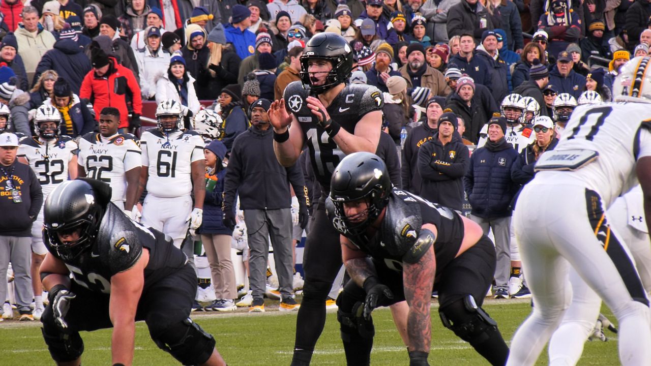 Army quarterback Bryson Daily (13) sets to throw a pass during a NCAA college football game against Navy, Saturday, Dec. 14, 2024, in Landover, Md. (Spectrum News 1/Jackson Wang)