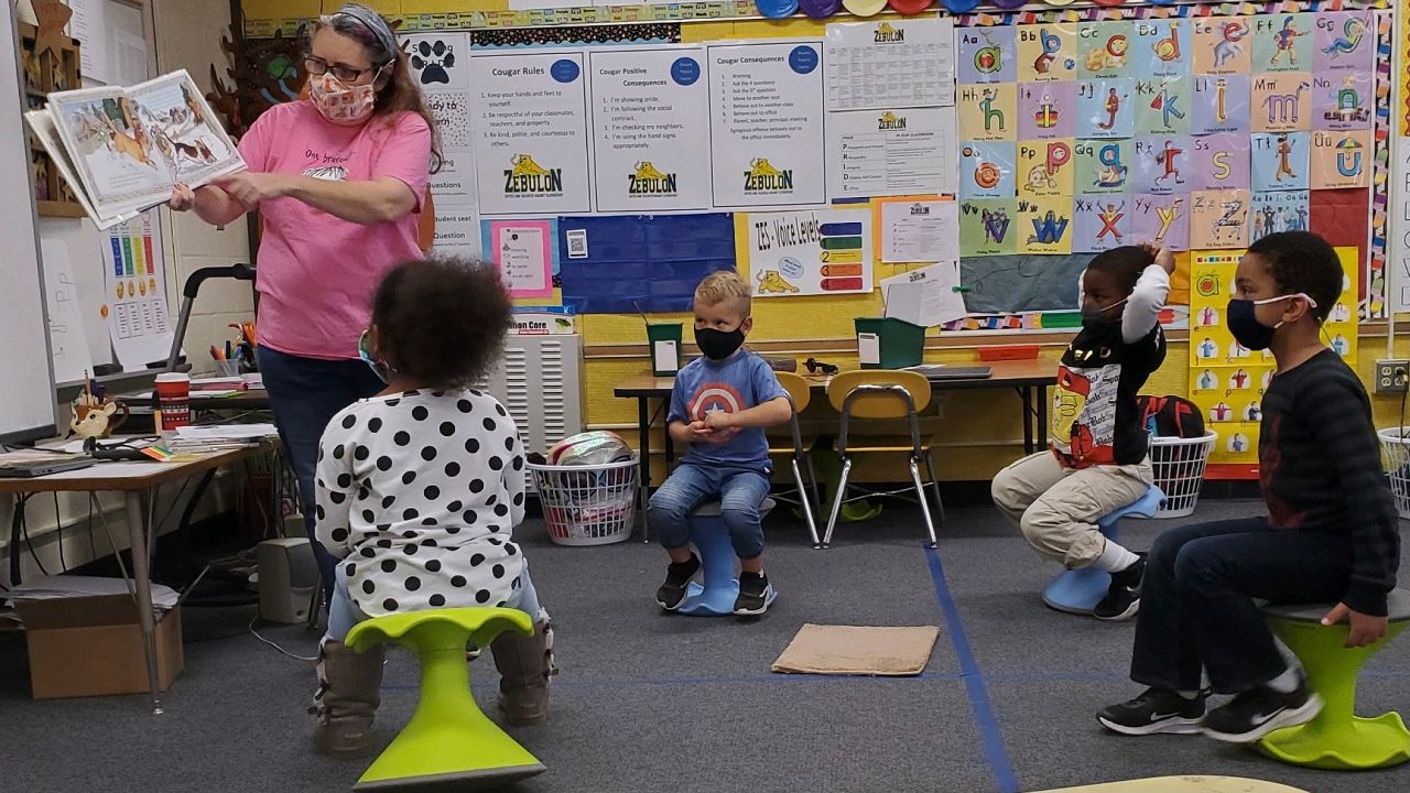 Erica Flory reading to students