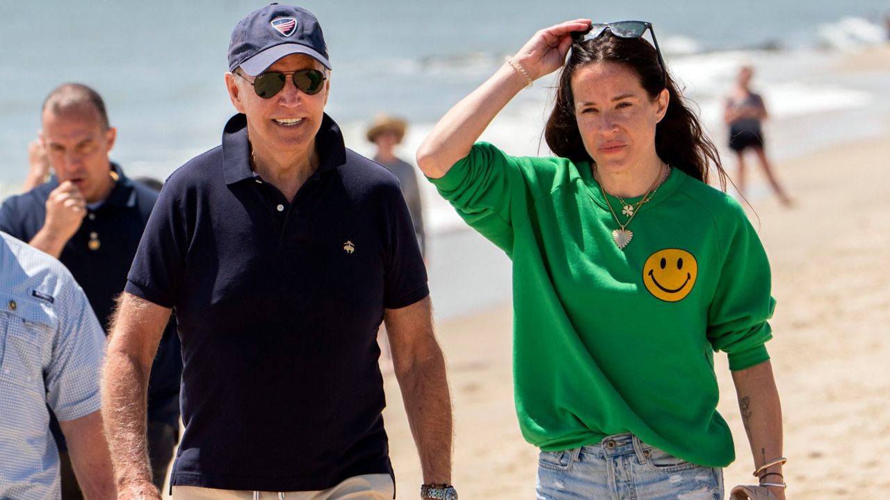 President Joe Biden walks on the beach with daughter Ashley Biden in Rehoboth Beach, Del., on June 20. (AP Photo/Manuel Balce Ceneta, File)