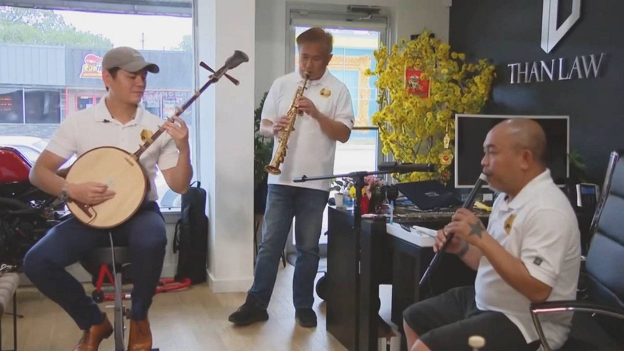 Asian Beats is a musical group from diverse places: Thailand, Taiwan, Hong Kong and Vietnam. Teacher-turned attorney Baolinh Than (left), Asia Trend Magazine founder Gary CK Lau (center) and Meng’s Kitchen owner Asawin “AJ” Knight Jockkeaw (right) gather to share Pan Asian music with a wider community. (Spectrum News)