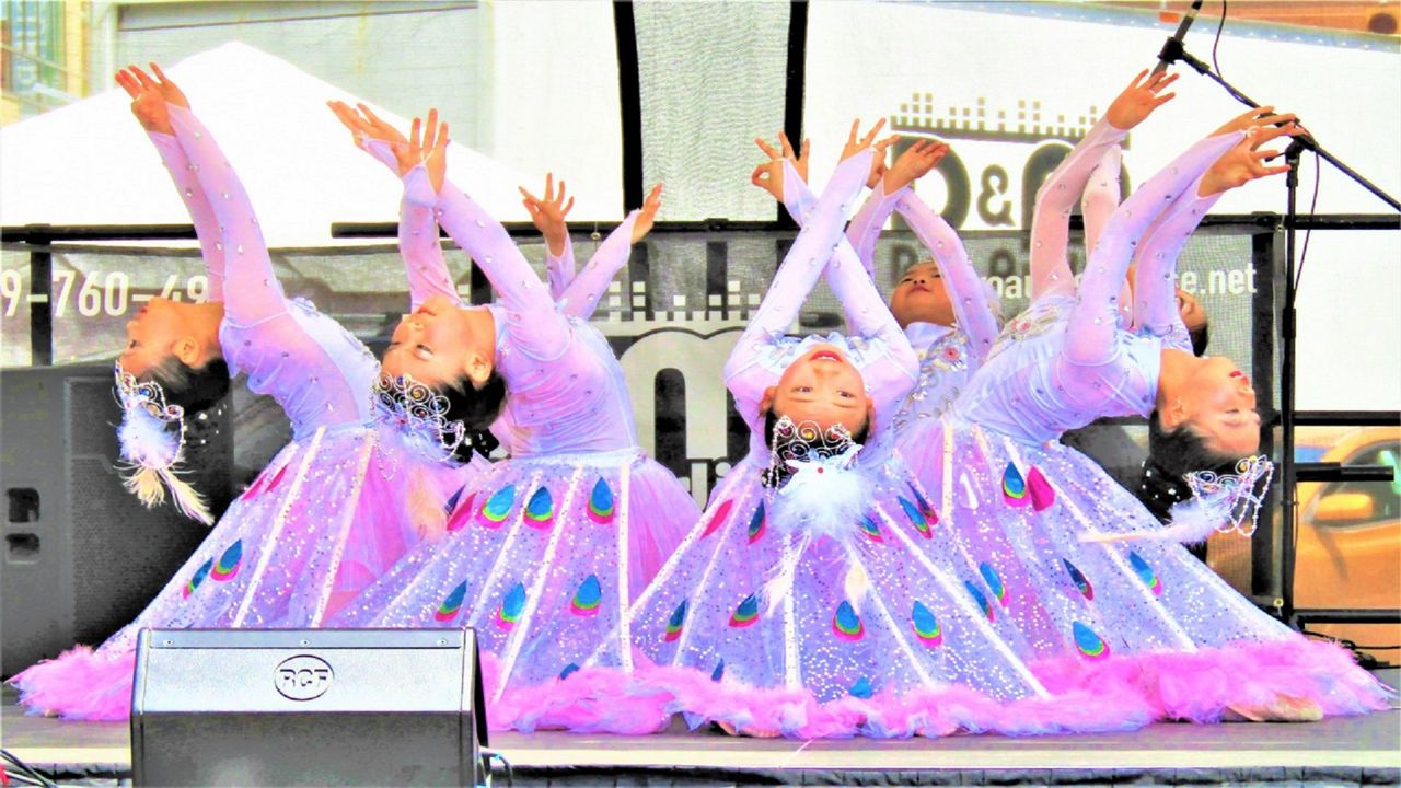 Young dancers perform on stage at Asian Food Fest in Cincinnati.