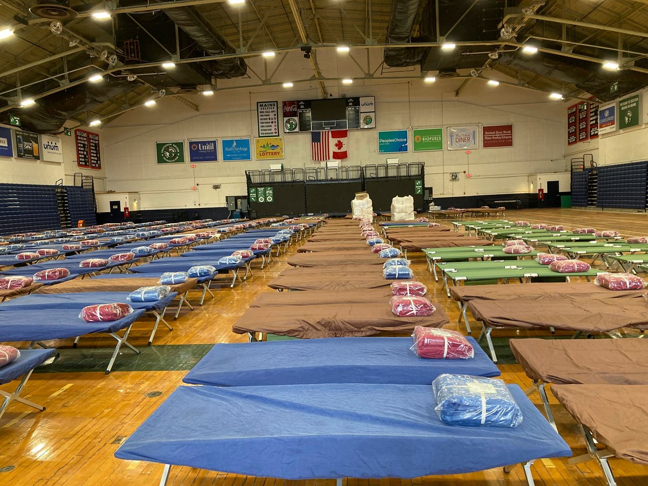 Bundles of bedding awaits unpacking on the floor of the Portland Expo, Friday, April 7. (AP Photo/David Sharp)