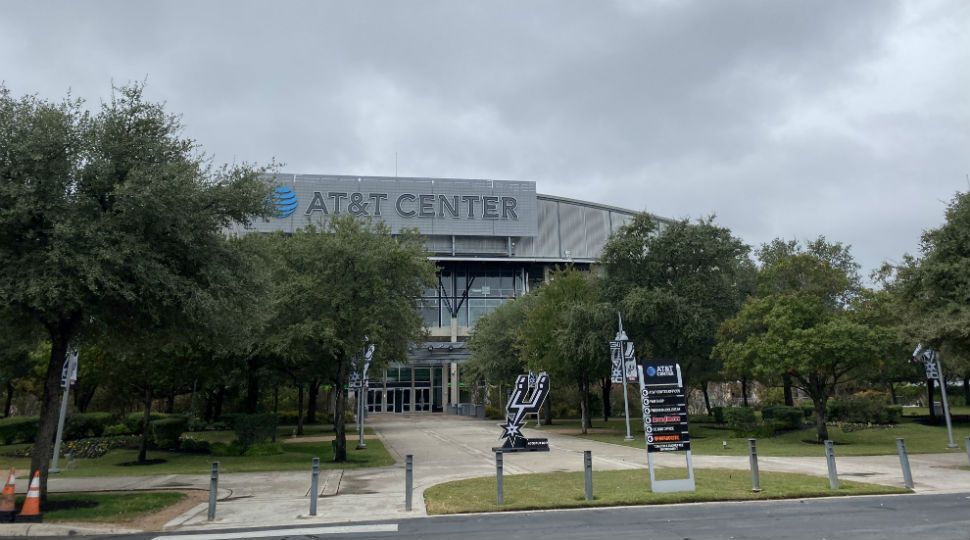 An image of the front of the AT&T Center in San Antonio on a cloudy day with the Spurs logo out front (Spectrum News/File)