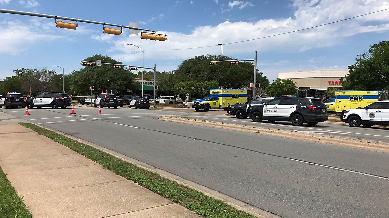 Austin Police Department and EMS vehicle appear on Great Hills Trail in Austin, Texas, following a shooting that claimed three live on April 18, 2021. (Spectrum News 1/Matt Mershon)