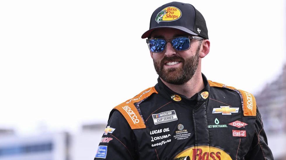 Driver Austin Dillon smiles prior to a NASCAR Cup Series auto race at Charlotte Motor Speedway, Sunday, May 26, 2024, in Concord, N.C. (AP Photo/Matt Kelley, File)