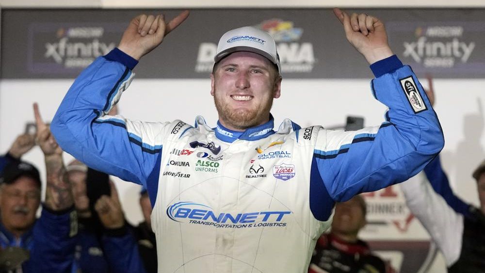 Austin Hill celebrates in Victory Lane after winning the NASCAR Xfinity Series auto race at Daytona International Speedway, Saturday, Feb. 18, 2023, in Daytona Beach, Fla. (AP Photo/John Raoux)