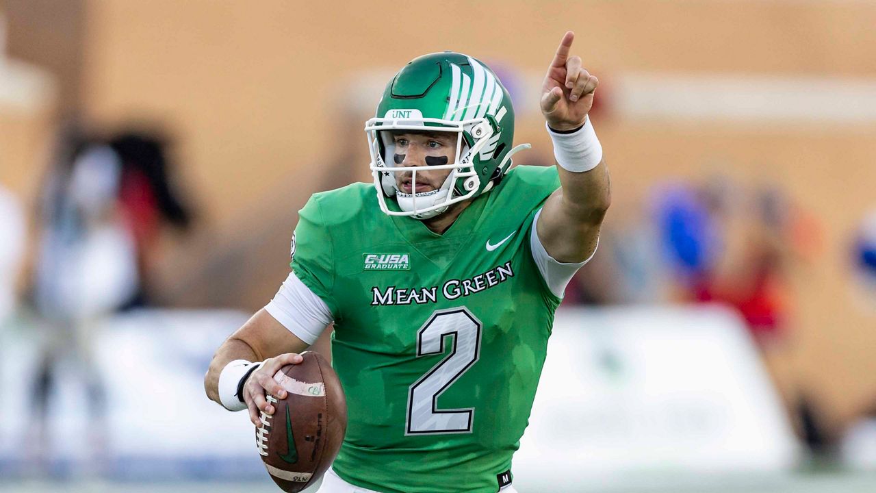 North Texas quarterback Austin Aune (2) is seen during an NCAA football game against Southern Methodist on Saturday, Sept. 3, 2022, in Denton, Texas. SMU won 48-10. (AP Photo/Brandon Wade)