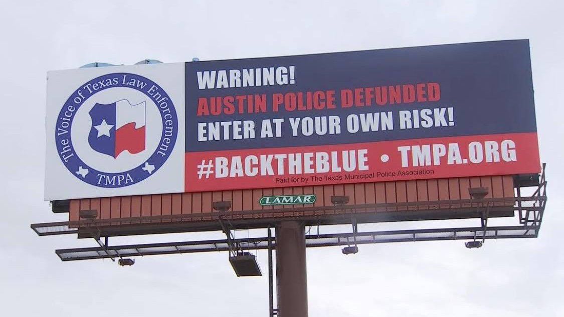 A billboard located along Interstate 35 in Central Texas brings attention to a police budget reduction in Austin. (Screen grab/Facebook)