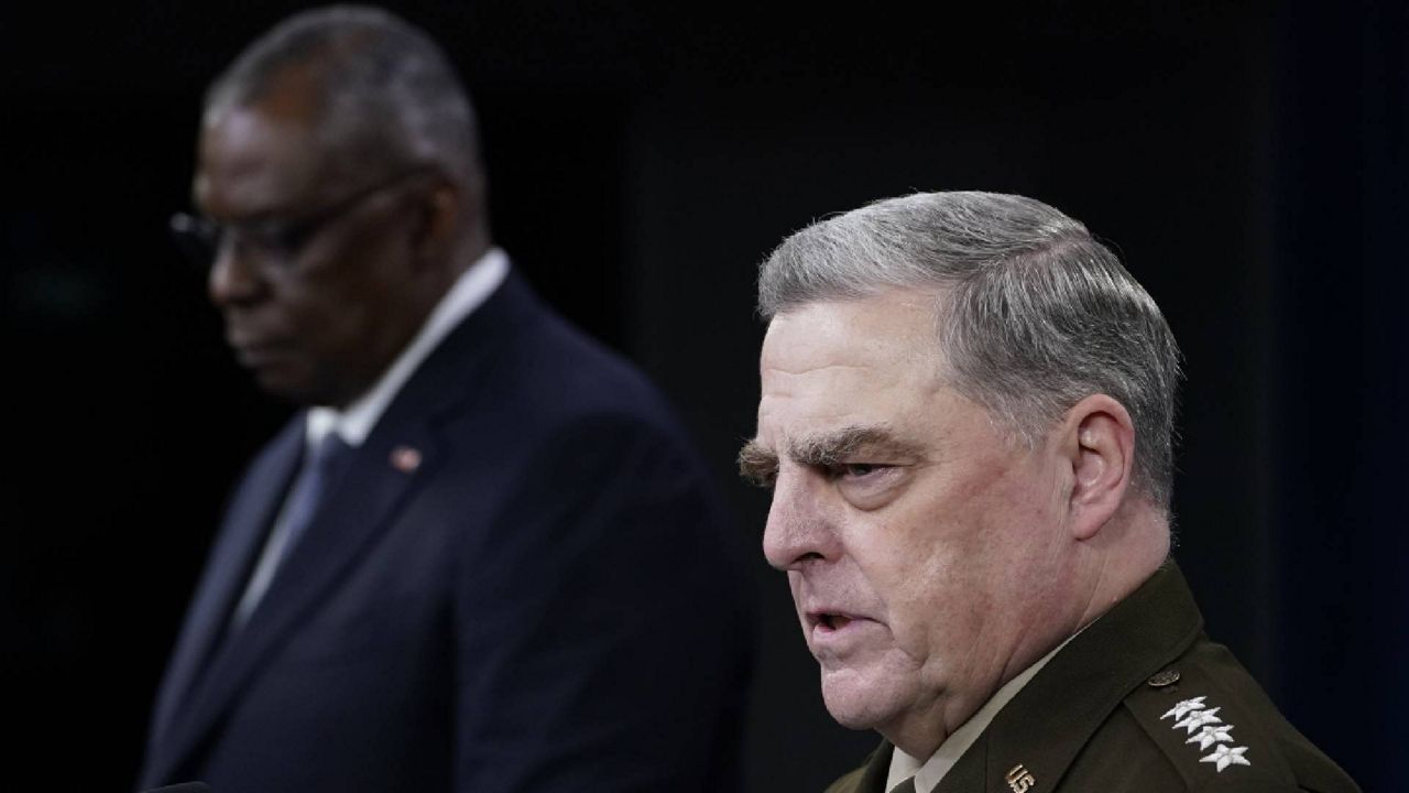 Joint Chiefs of Staff Gen. Mark Milley, right, answers a question during a briefing with Secretary of Defense Lloyd Austin, left, at the Pentagon in Washington, Wednesday, Sept. 1, 2021, about the end of the war in Afghanistan. (AP Photo/Susan Walsh)