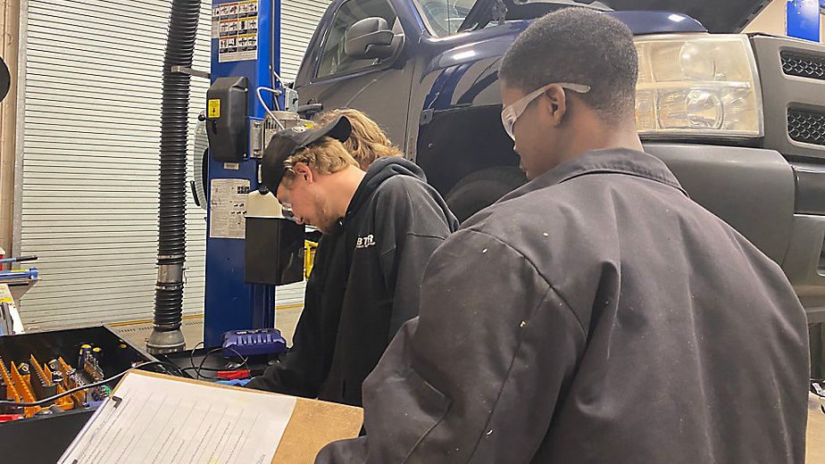 Students working in diesel automotive. (File)