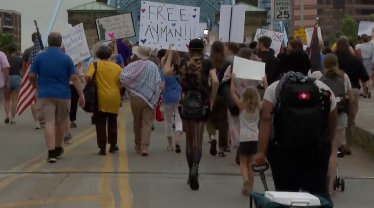 More than a dozen people were arrested by Covington Police Thursday evening during a rally for Ayman Soliman, the local community and religious leader who was detained by ICE earlier this month.