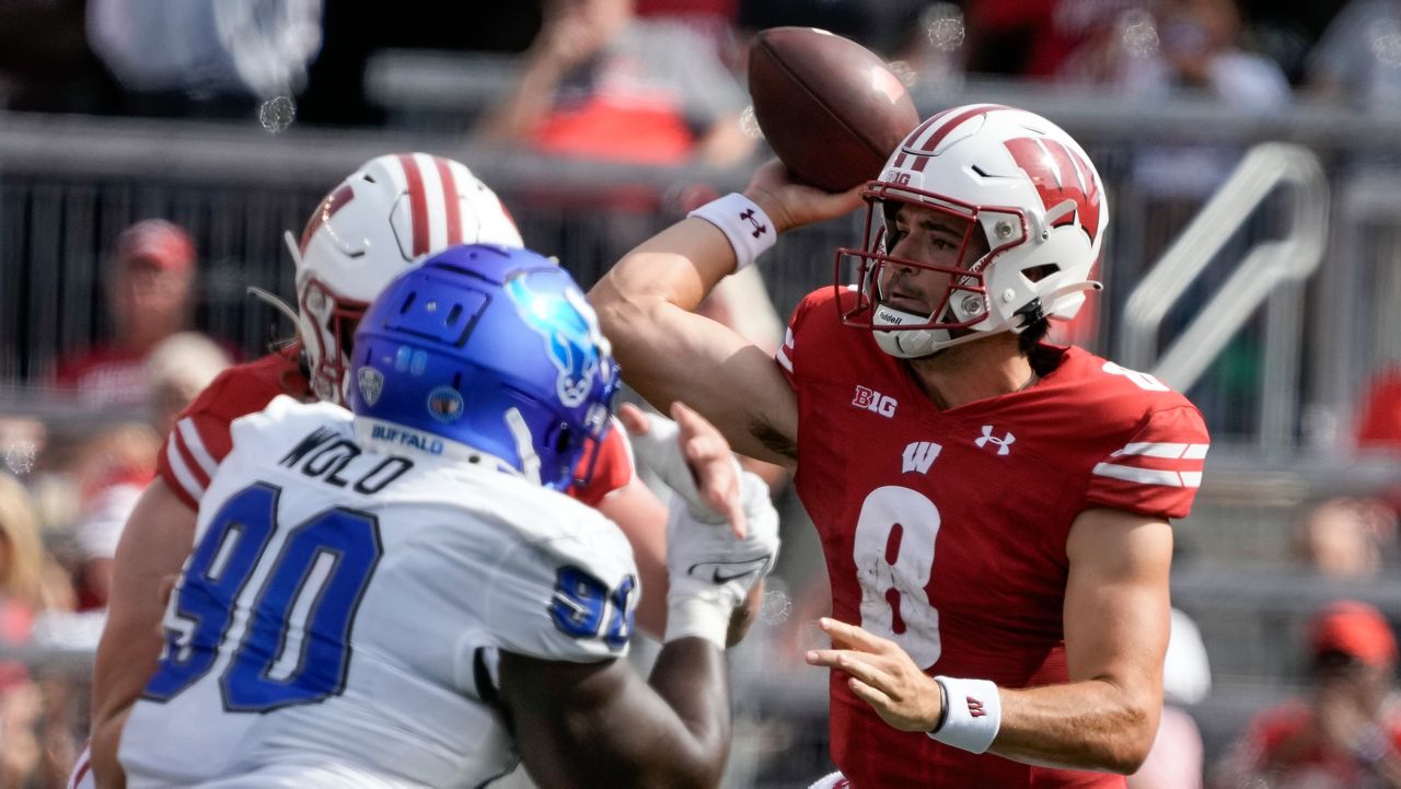 Wisconsin quarterback Tanner Mordecai (8) throws during the first half of an NCAA college football game against Buffalo Saturday, Sept. 2, 2023, in Madison, Wis. 