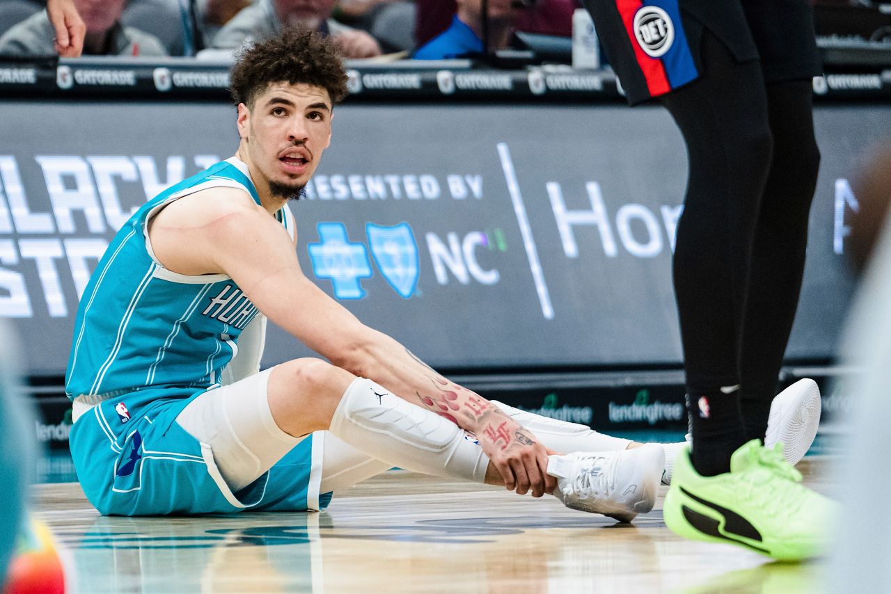 LaMelo Ball holds his ankle