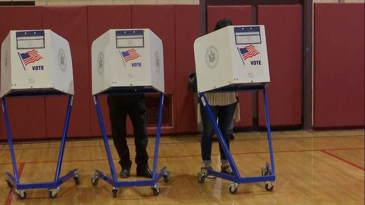 People vote in this file image. (Associated Press)