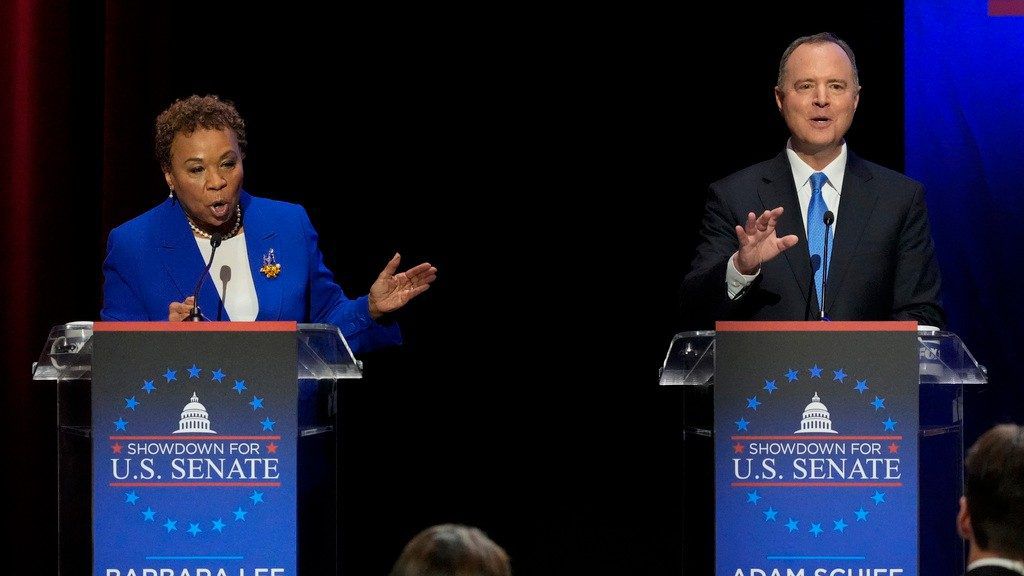 U.S. Rep. Barbara Lee, D-Calif., left, speaks alongside U.S. Rep. Adam Schiff, D-Calif., during a televised debate for candidates in the senate race to succeed the late California Sen. Dianne Feinstein, Monday, Jan. 22, 2024, in Los Angeles. (AP Photo/Damian Dovarganes)