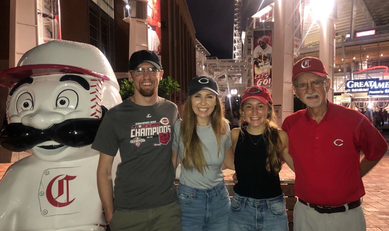 Barry Million poses for photos with family members outside Great American Ball Park. Million has been to dozens of Reds games during his life. (Photo courtesy of Barry Million)