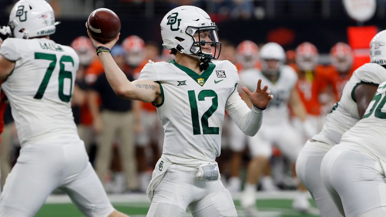 Baylor quarterback Blake Shapen passes the ball during the second half of the Big 12 Championship NCAA college football game against Oklahoma State in Arlington, Texas, Saturday, Dec. 4, 2021. Baylor is set to kick off its season on Sept. 3, 2022, against Albany. (AP Photo/Roger Steinman, File)