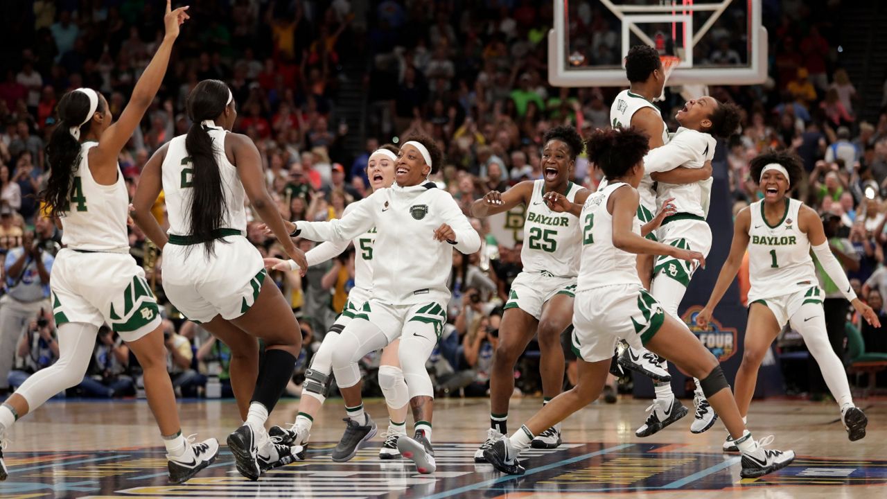 The Baylor team celebrates after defeating Notre Dame 82-81 during the Final Four championship game of the NCAA women's college basketball tournament Sunday, April 7, 2019, in Tampa, Fla. (AP Photo/John Raoux)