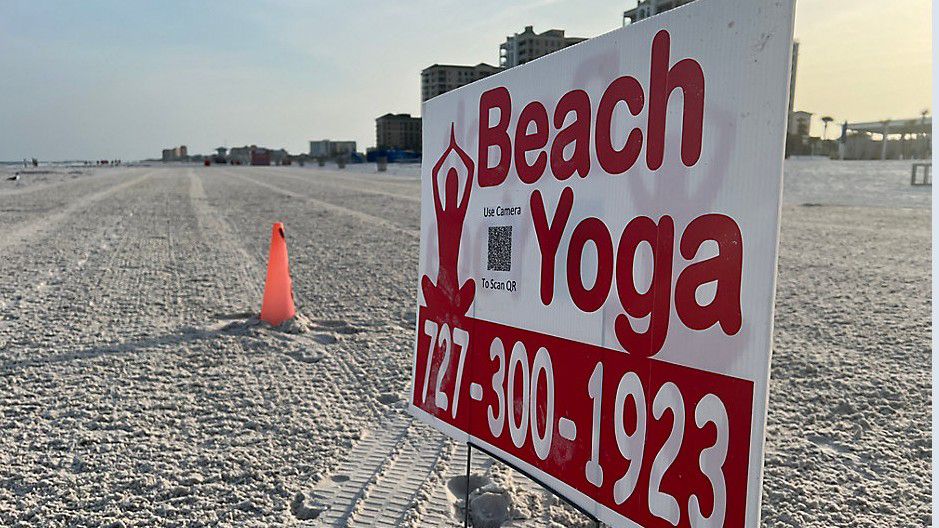 Daily beach yoga classes on Clearwater Beach